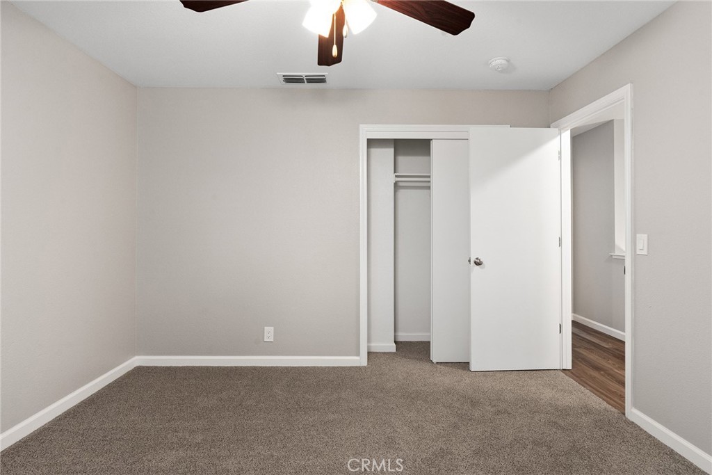 2159 Elm Street, Unit 2 Chico, CA 95928 - Photo 19 of 28 an empty room with a ceiling fan