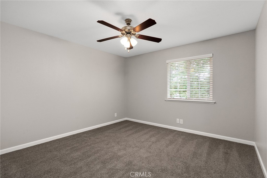 2159 Elm Street, Unit 2 Chico, CA 95928 - Photo 20 of 28 an empty room with closet and windows