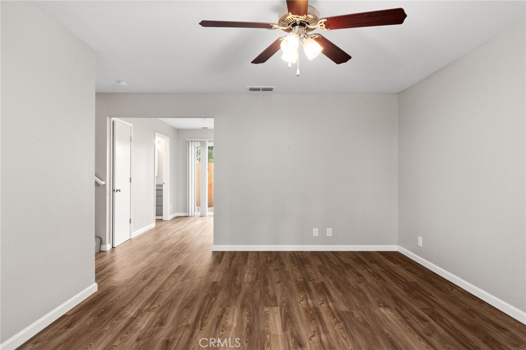 2159 Elm Street, Unit 2 Chico, CA 95928 - Photo 2 of 28 wooden floor in an empty room with a window