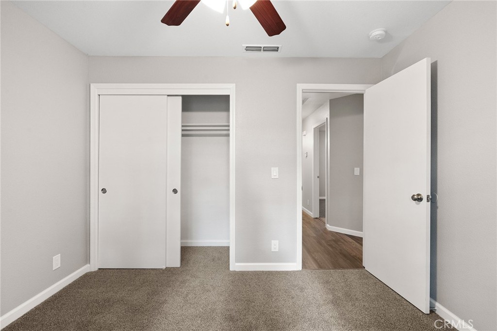 2159 Elm Street, Unit 2 Chico, CA 95928 - Photo 23 of 28 an empty room with closet and windows