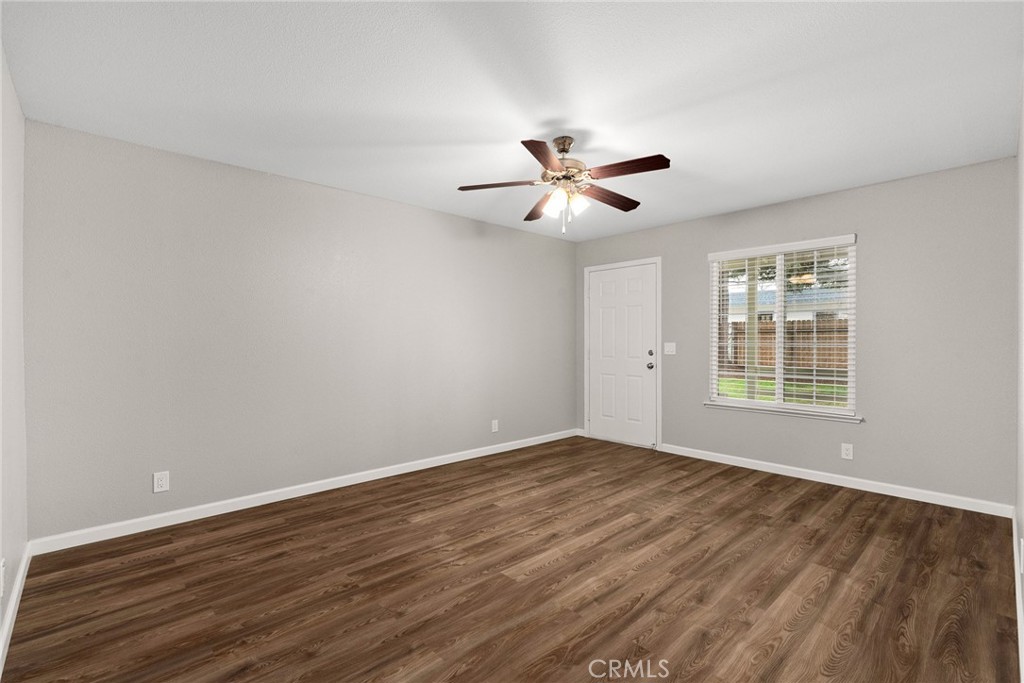 2159 Elm Street, Unit 2 Chico, CA 95928 - Photo 3 of 28 a view of a big room with wooden floor and windows