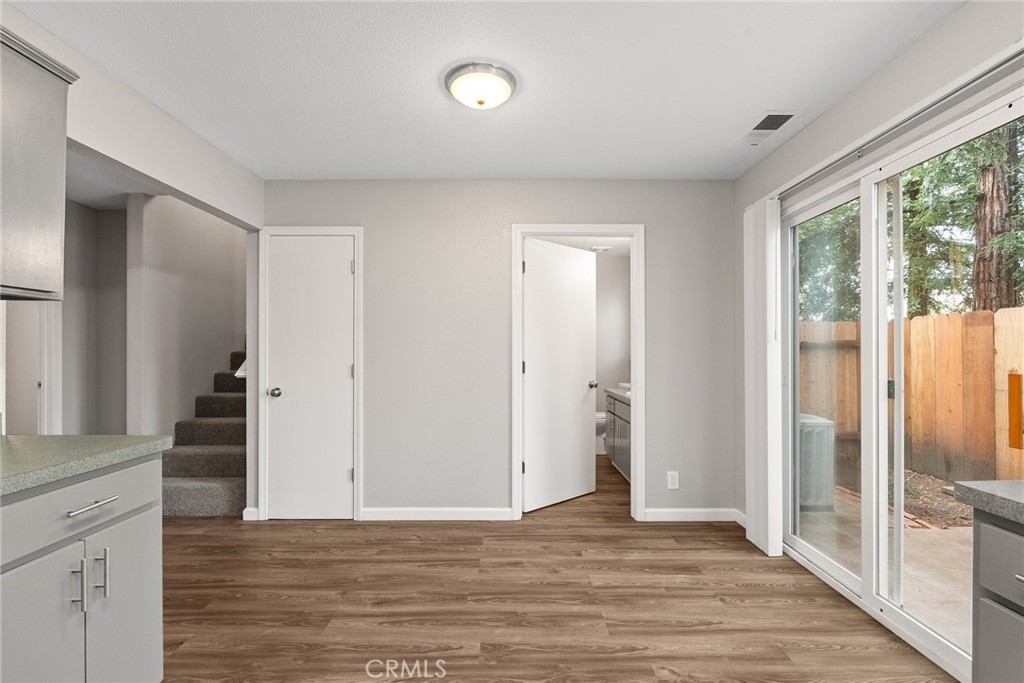 2159 Elm Street, Unit 2 Chico, CA 95928 - Photo 7 of 28 a view of a hallway with wooden floor and staircase