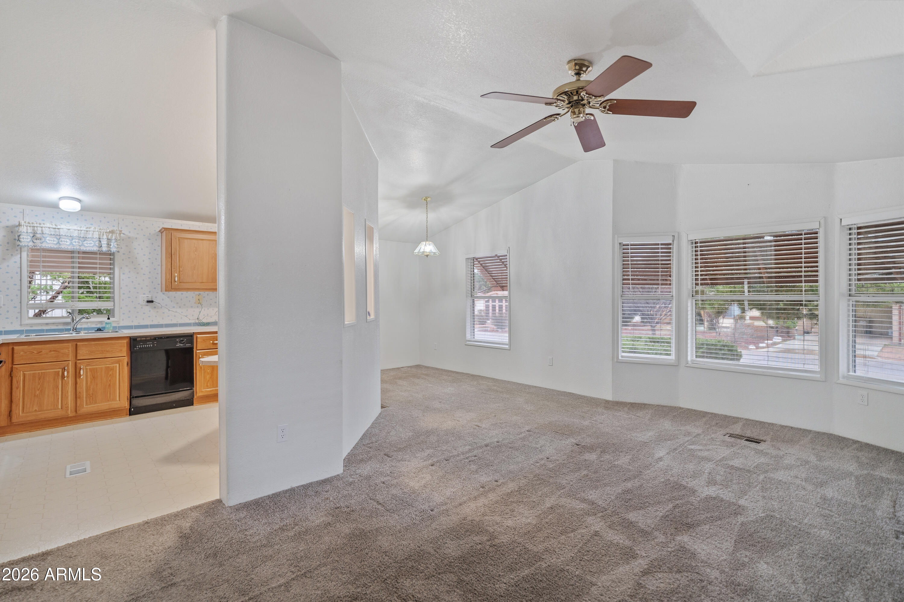 1106 West Crestview Drive Payson, AZ 85541 - Photo 15 of 24 a view of an empty room with a kitchen