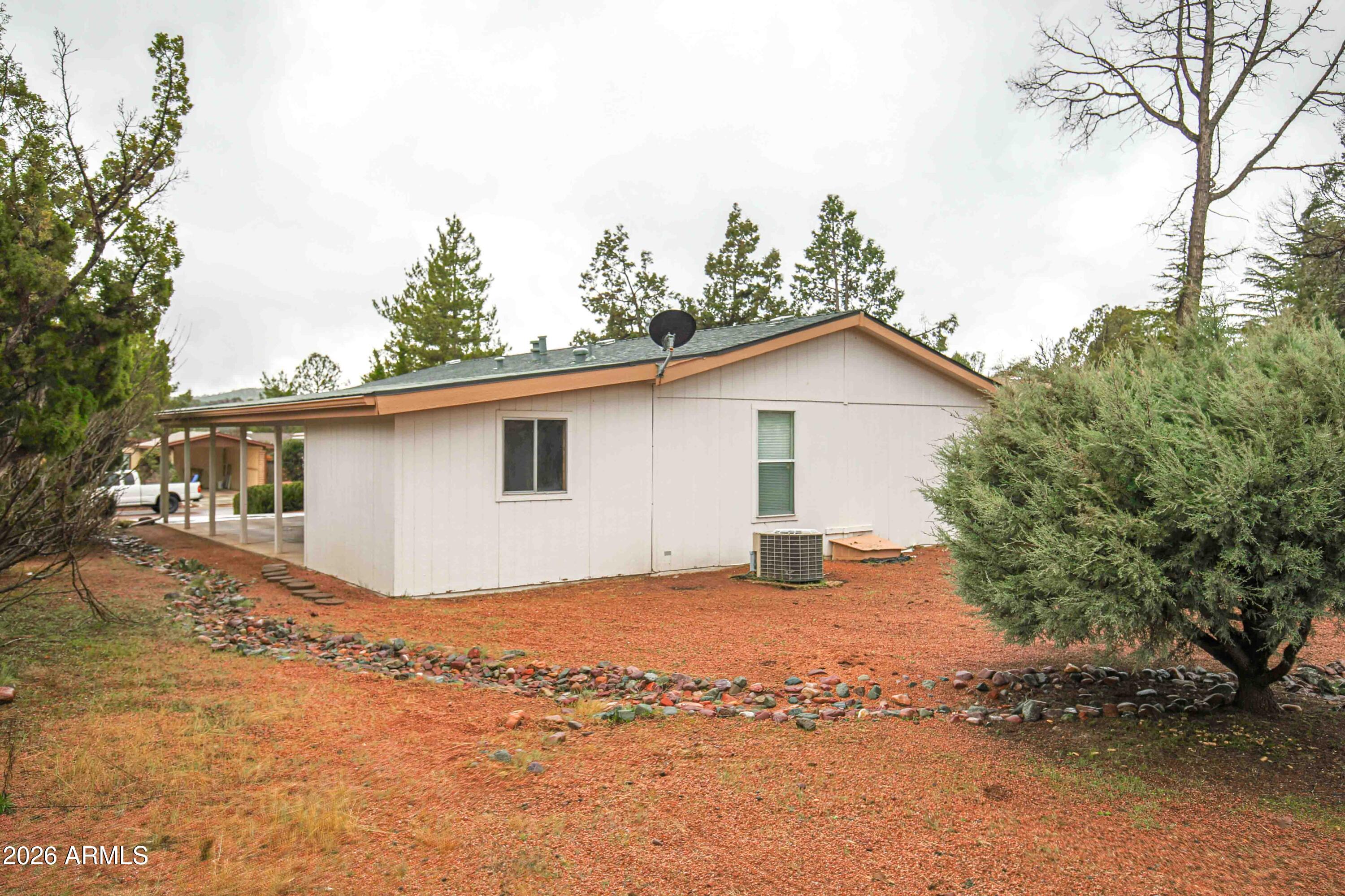 1106 West Crestview Drive Payson, AZ 85541 - Photo 22 of 24 a view of a house with a yard