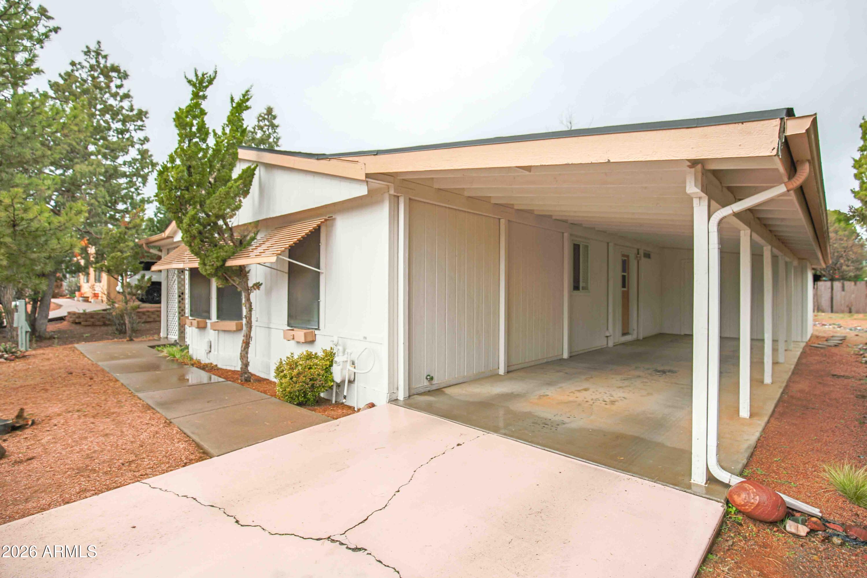 1106 West Crestview Drive Payson, AZ 85541 - Photo 23 of 24 a view of a house with a backyard