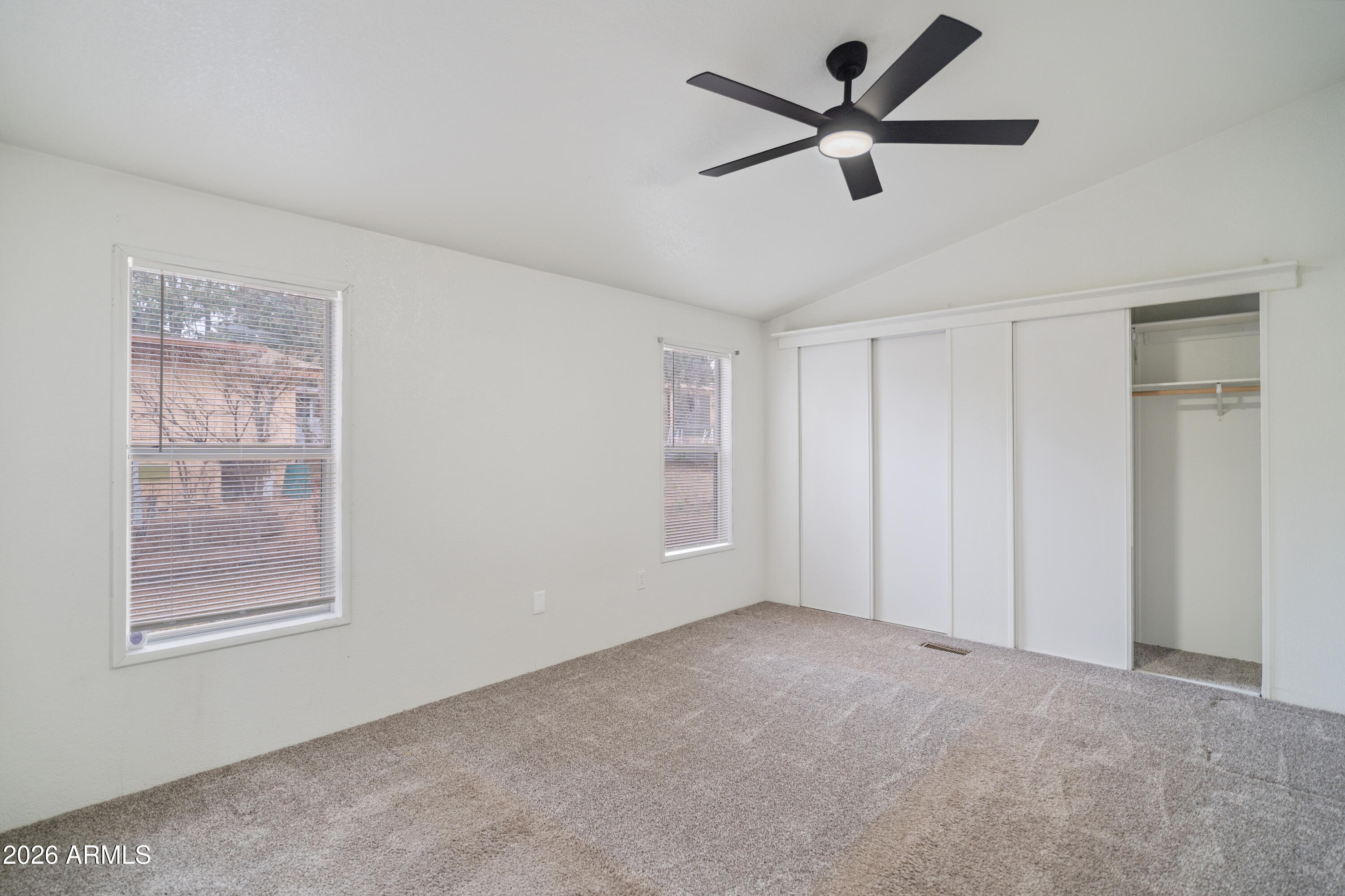 1106 West Crestview Drive Payson, AZ 85541 - Photo 3 of 24 a view of a livingroom with a ceiling fan and window