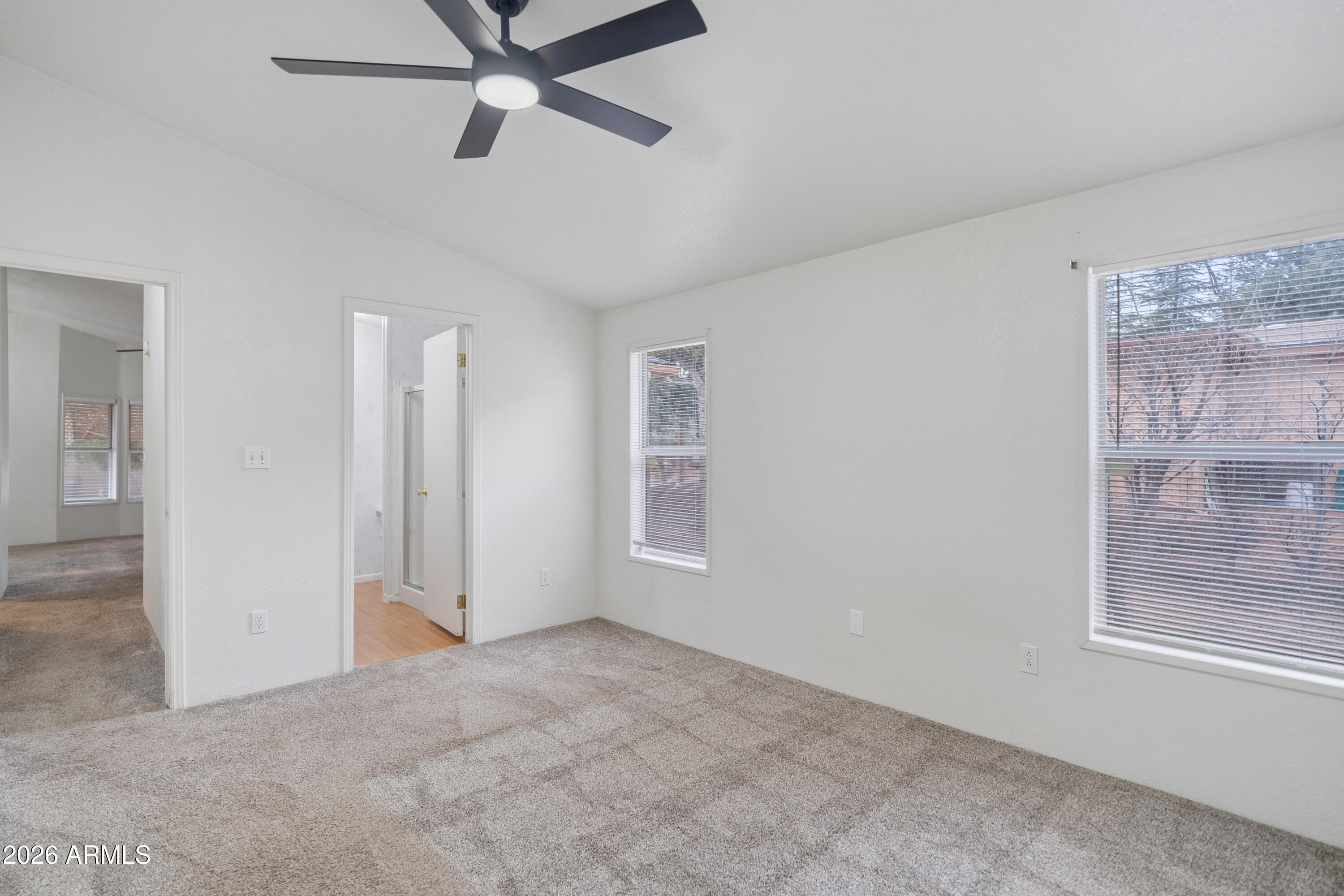 1106 West Crestview Drive Payson, AZ 85541 - Photo 5 of 24 a view of an empty room with a window