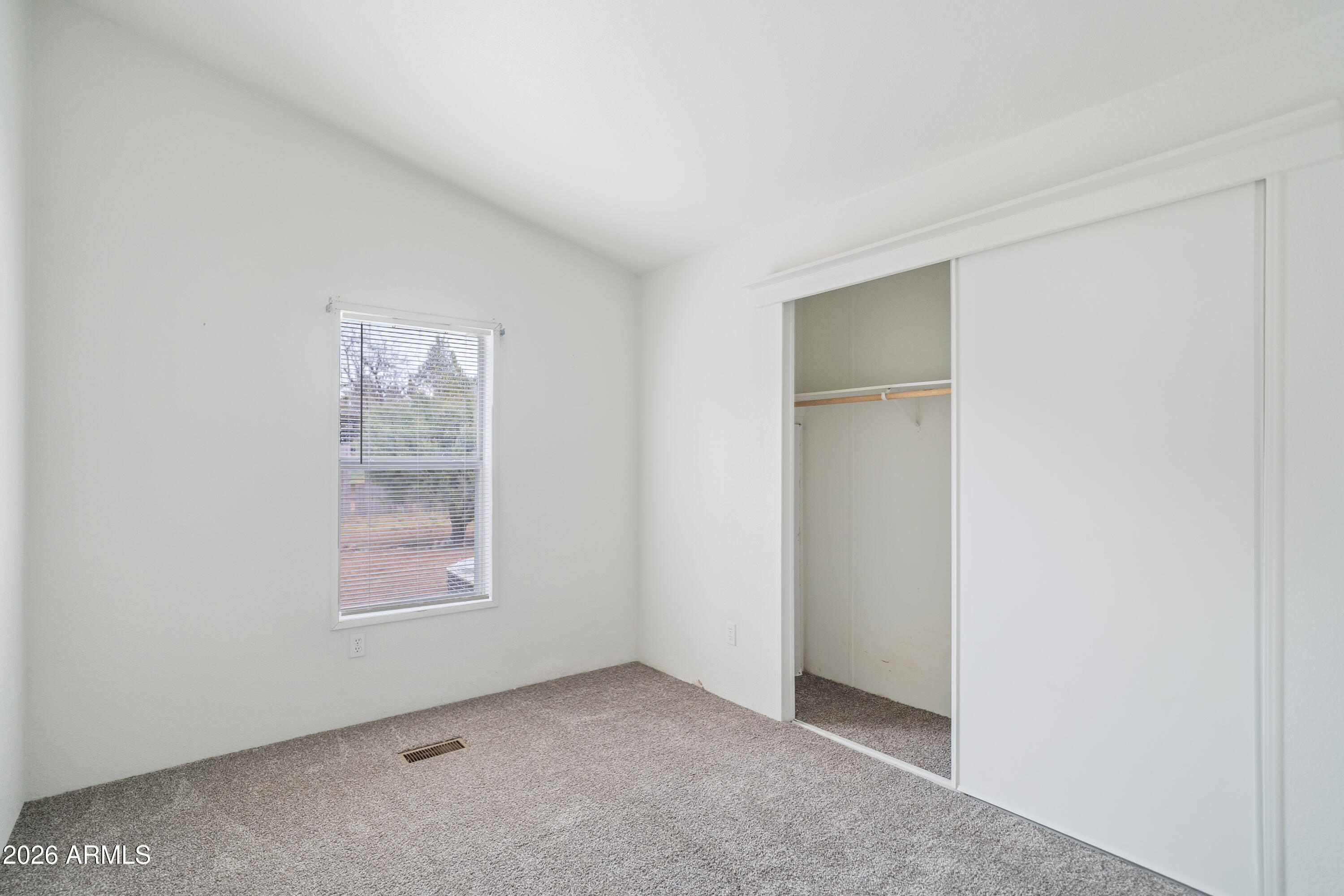 1106 West Crestview Drive Payson, AZ 85541 - Photo 6 of 24 an empty room with windows