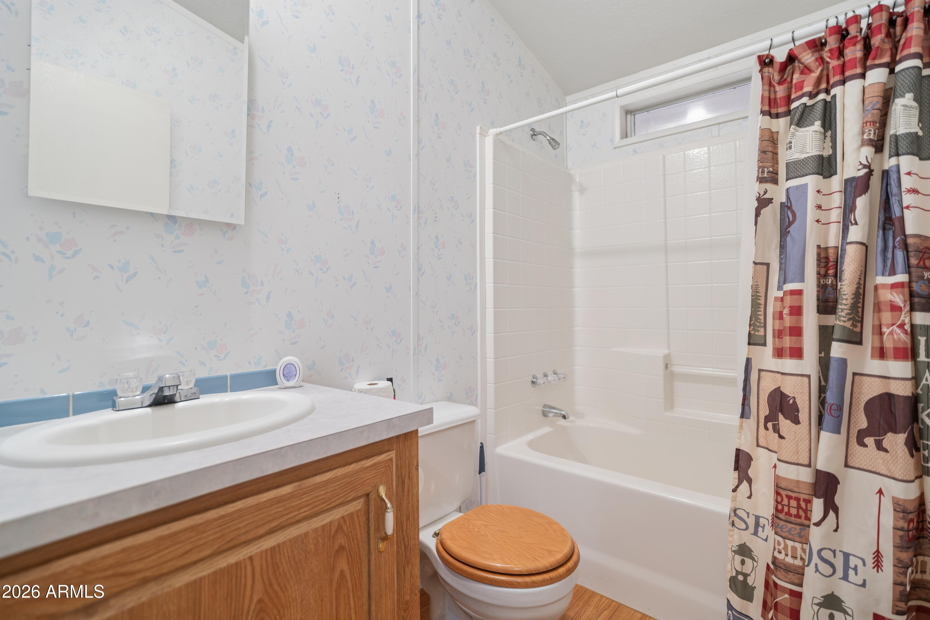 1106 West Crestview Drive Payson, AZ 85541 - Photo 8 of 24 a bathroom with a sink toilet and shower