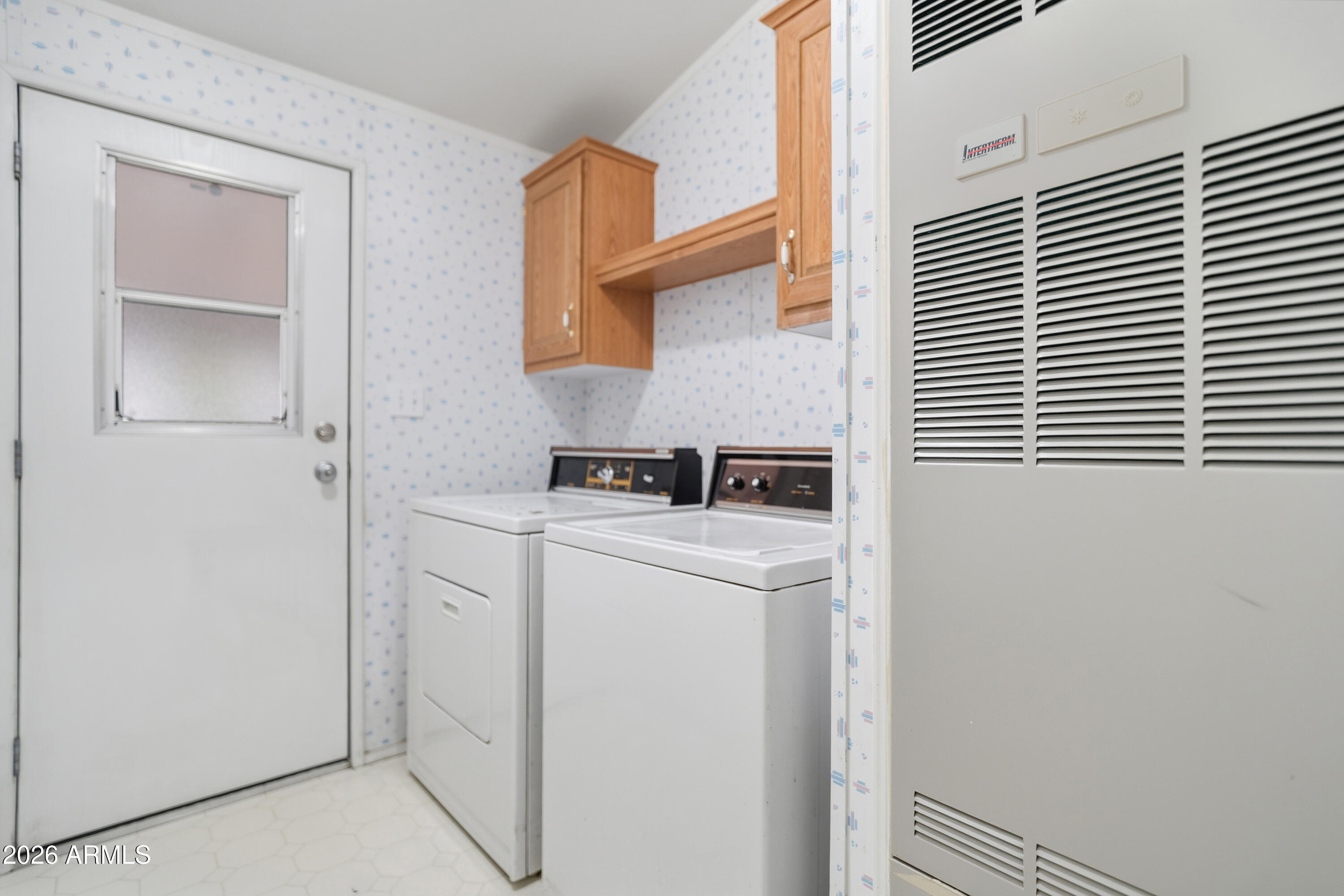 1106 West Crestview Drive Payson, AZ 85541 - Photo 9 of 24 a utility room with dryer and washer
