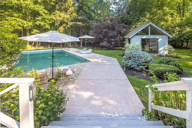 a garden view with a seating space