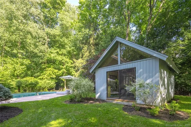 a house view with a garden space