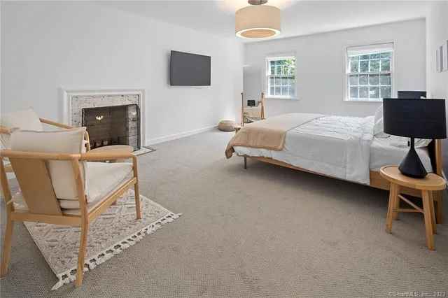 a bathroom with a shower and sink