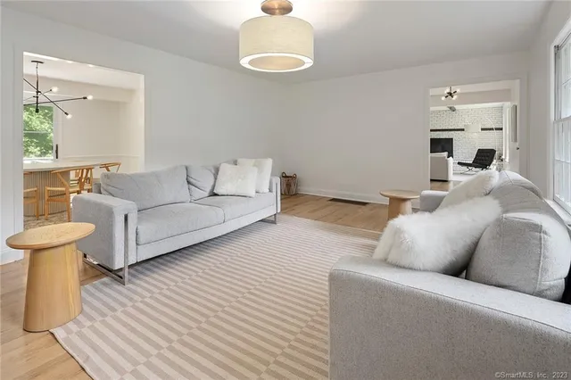 a dining room with a table and chairs