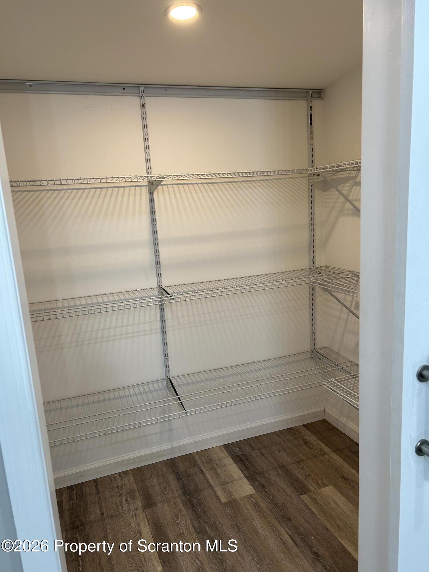 337 Wayne Street Archbald, PA 18403 - Photo 11 of 26 a view of a room with wooden floor