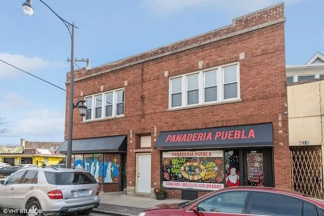a car parked in front of a building
