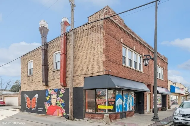 a view of street with shops