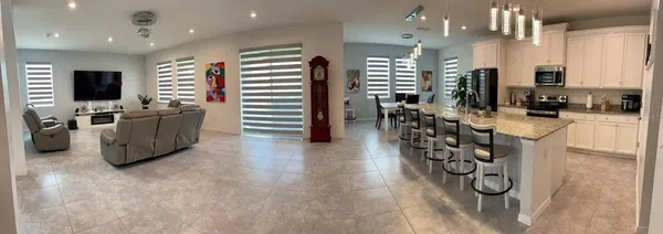 a view of a dining room with furniture