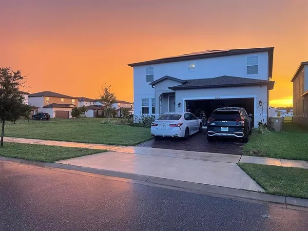 a house view with a garden space