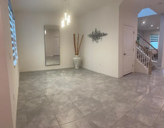 a view of a livingroom with furniture and cabinets