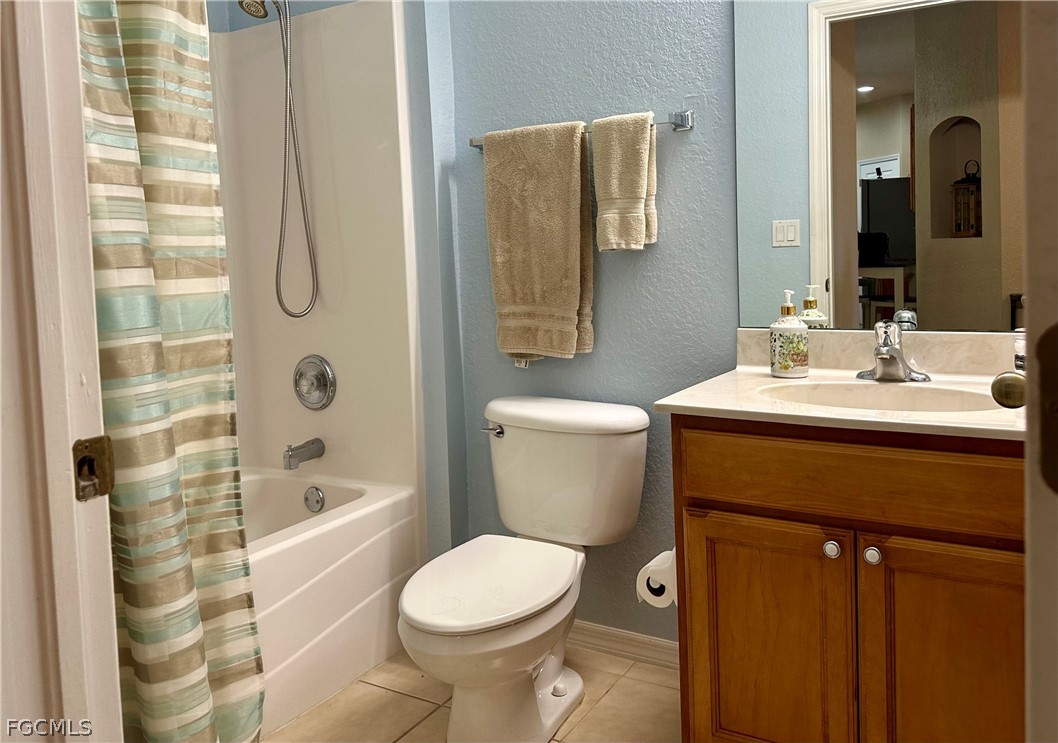 14122 Danpark Loop Fort Myers, FL 33912 - Photo 10 of 15 a bathroom with a sink toilet and shower