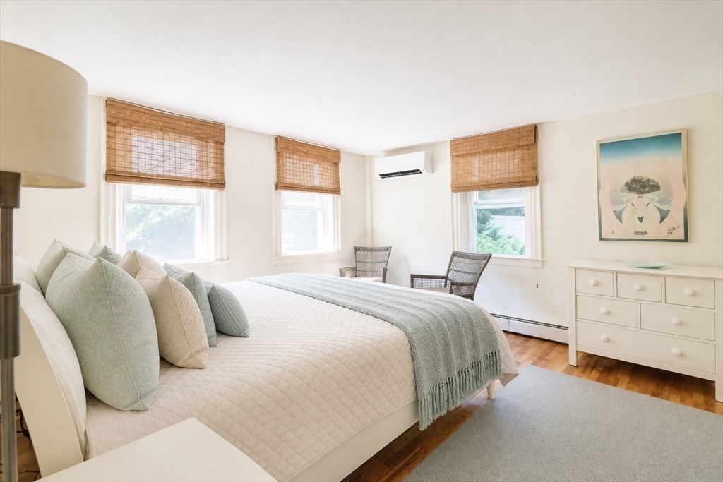 60 Rock Harbor Road Orleans, MA 02653 - Photo 19 of 37 a bedroom with a bed and a window