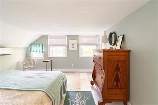 60 Rock Harbor Road Orleans, MA 02653 - Photo 24 of 37 a bedroom with a bed and a window