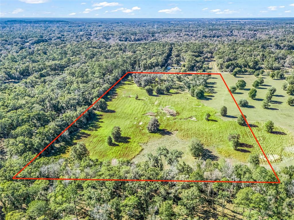 Tbd Northwest 127th Court Ocala, FL 34482 - Photo 13 of 17 a view of a lush green field