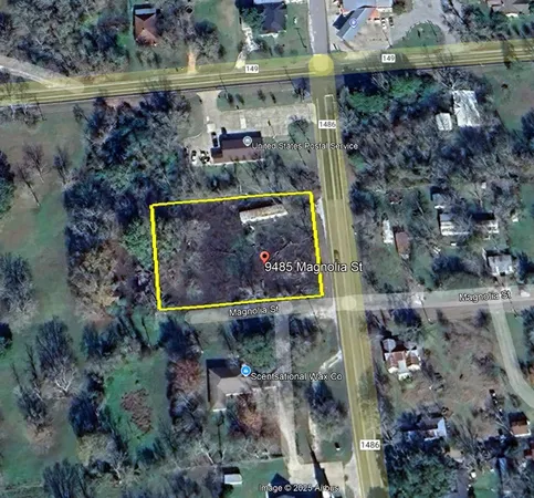 an aerial view of residential house with outdoor space