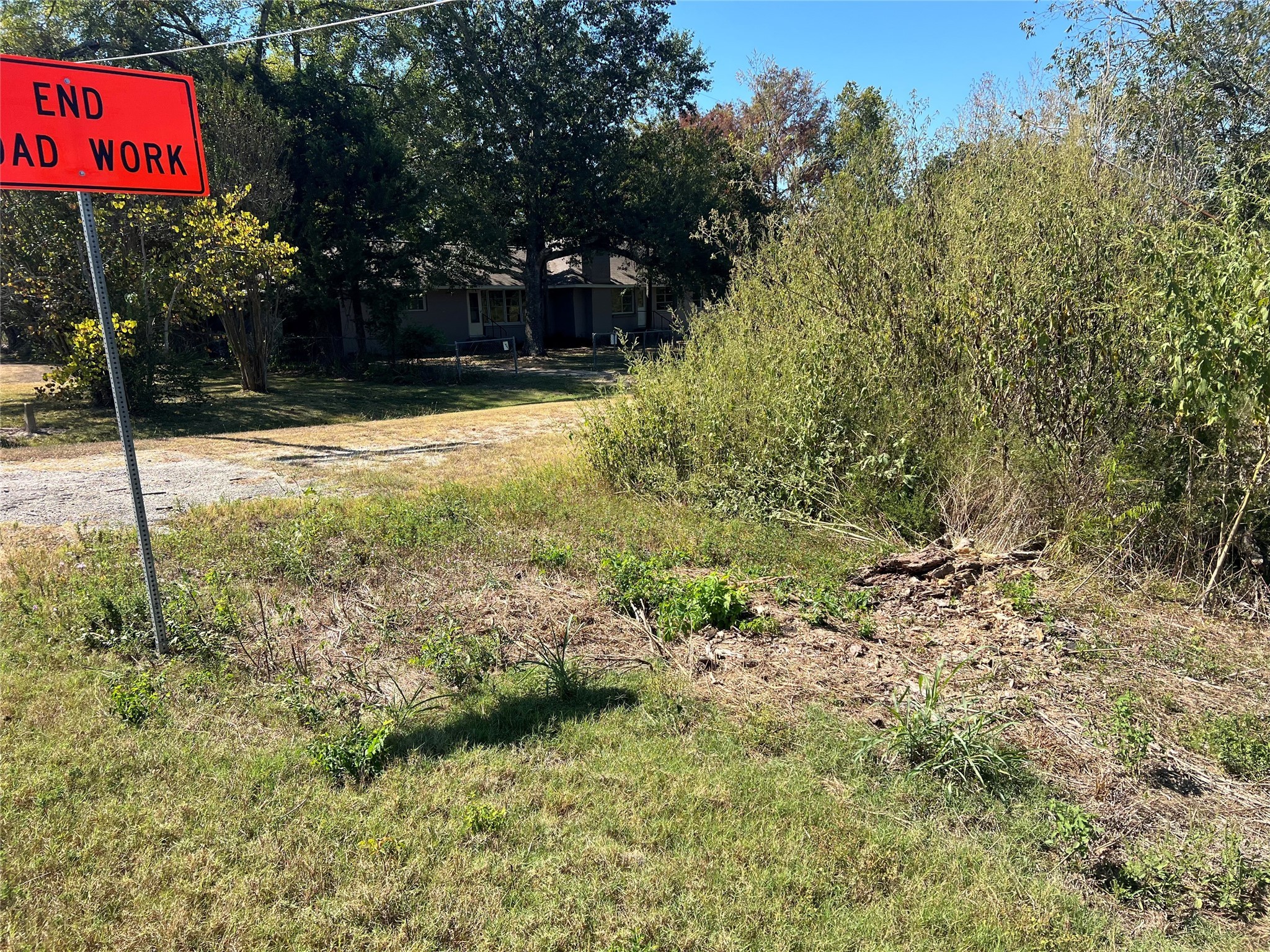 9485 Magnolia Drive Richards, TX 77873 - Photo 6 of 7 a view of outdoor space with sign board