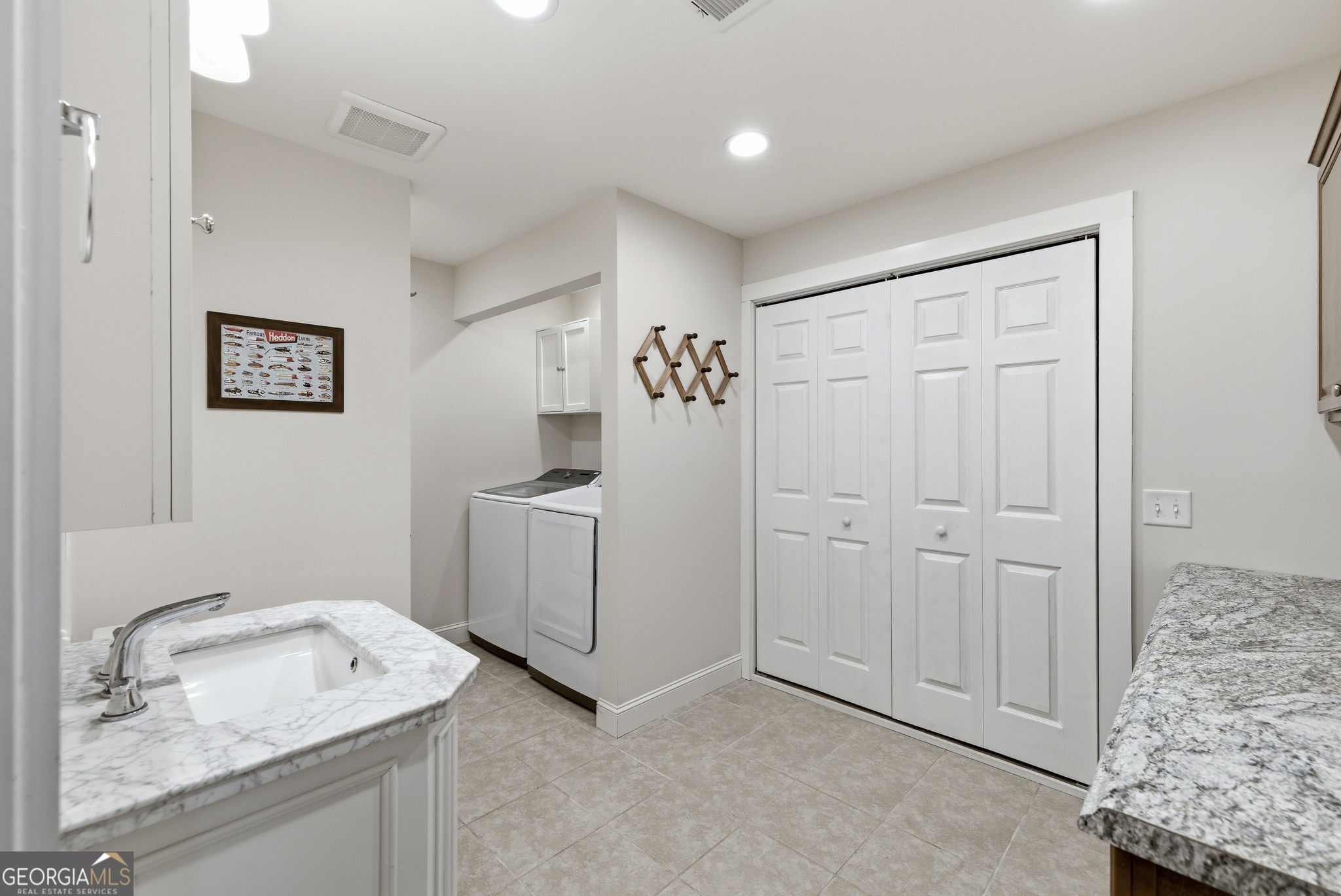 634 Little Hawk Road Sautee Nacoochee, GA 30571 - Photo 40 of 54 a bathroom with a sink and a mirror