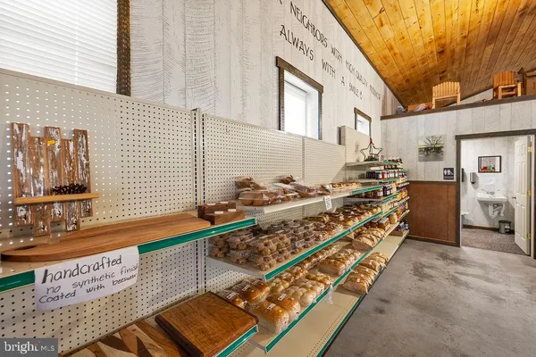 a view of a shop with walk in closet