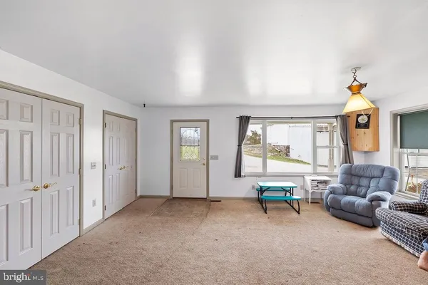 a view of an entryway with furniture