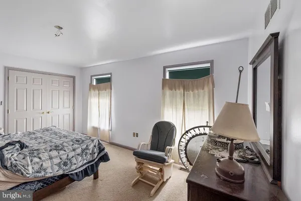 a room with furniture and a flat screen tv