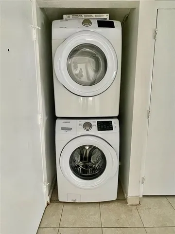 a front view of a house with garage