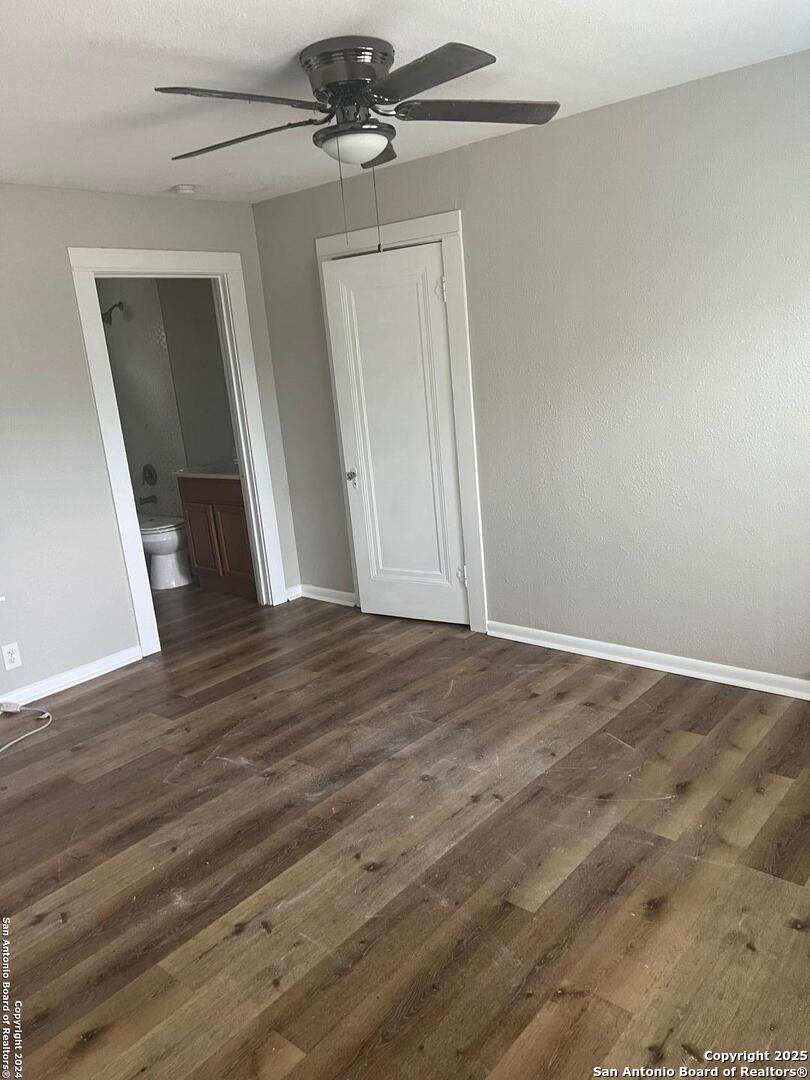 1519 East Southcross, Unit 1 San Antonio, TX 78223 - Photo 4 of 9 a view of empty room with wooden floor