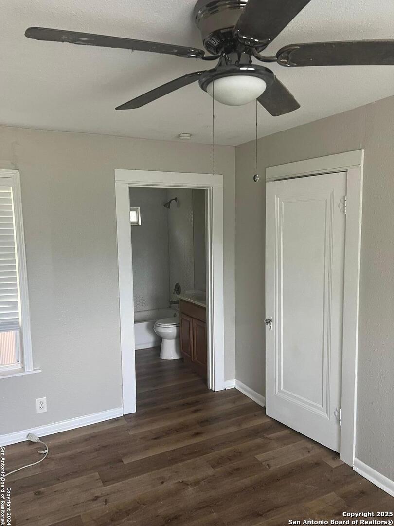 1519 East Southcross, Unit 1 San Antonio, TX 78223 - Photo 5 of 9 a view of a bathroom with a sink and a mirror