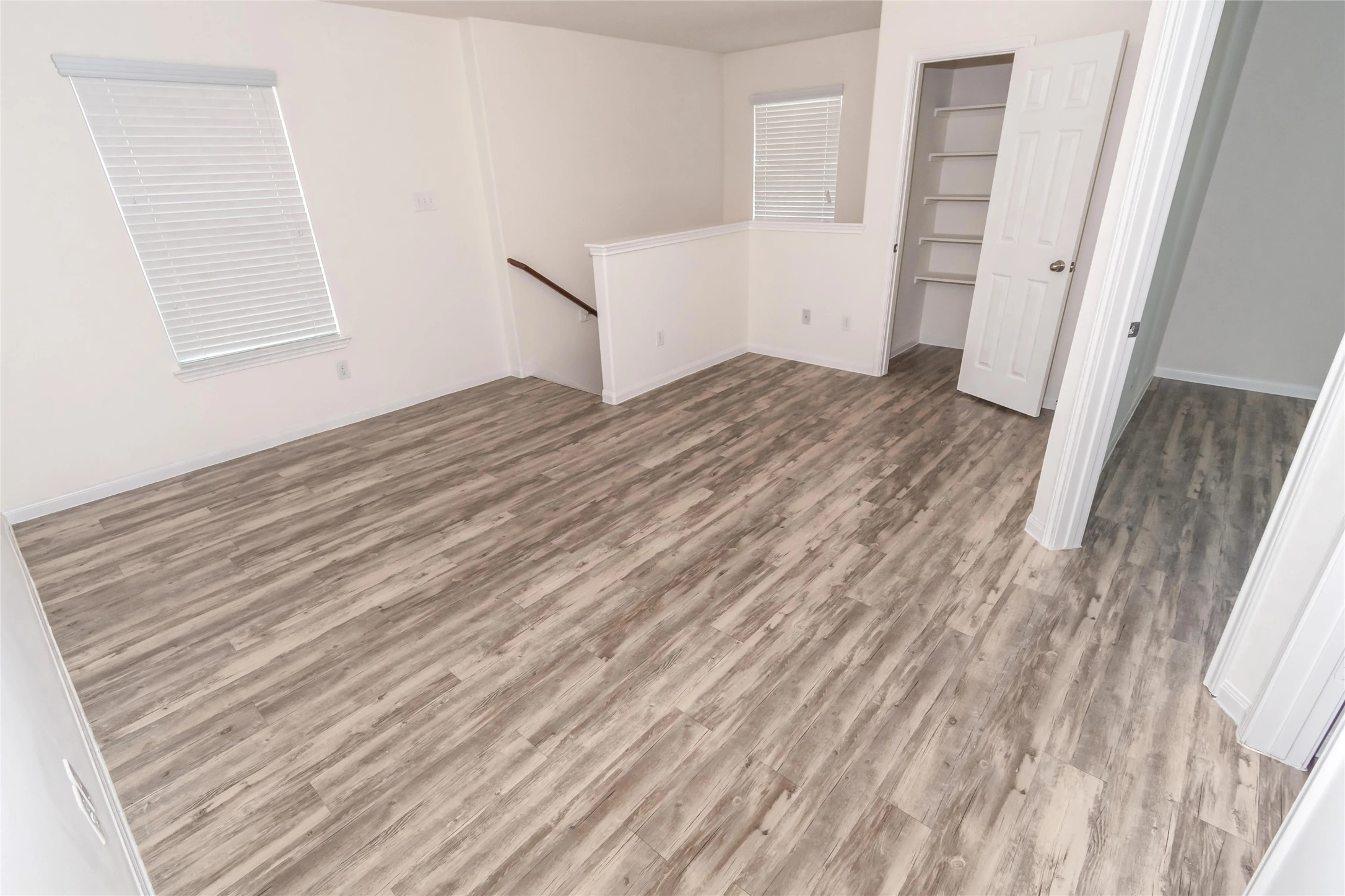 3030 Junction Drive Houston, TX 77045 - Photo 5 of 8 an empty room with windows