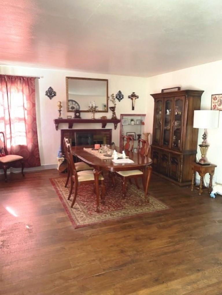 826 South Park Boulevard Freeport, IL 61032 - Photo 2 of 13 a living room with furniture a rug and a fireplace