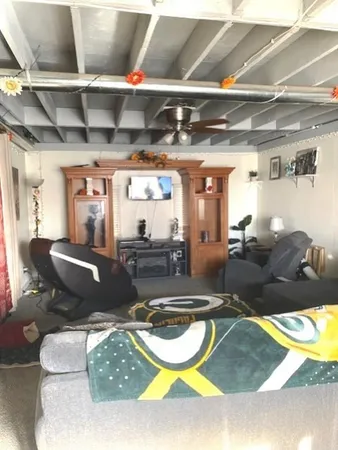 a room with lots of gym equipment