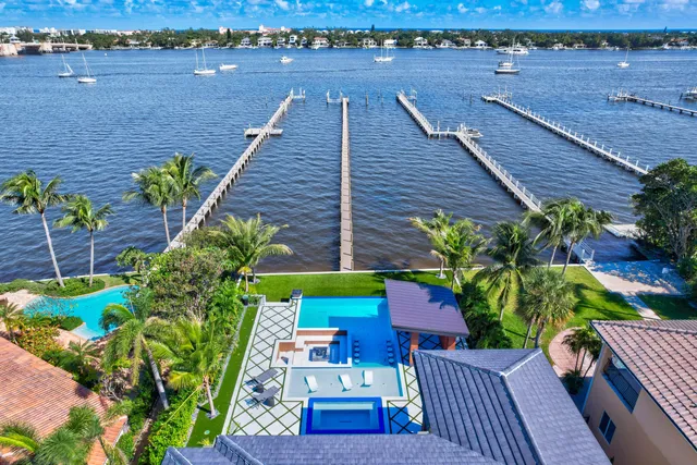 a kitchen with stainless steel appliances granite countertop a stove sink and cabinets
