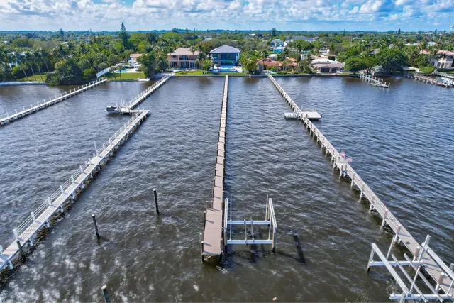 a view of kitchen with kitchen island granite countertop lots of counter top space