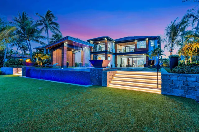 a front view of a house with swimming pool