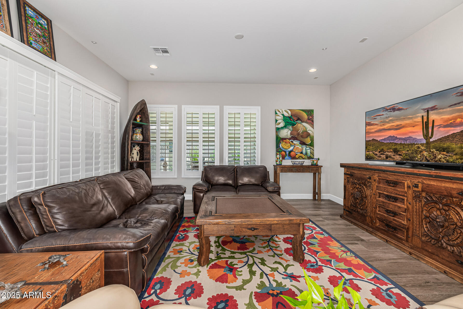 17810 East StockingTrail Rio Verde, AZ 85263 - Photo 13 of 61 a living room with furniture and a flat screen tv