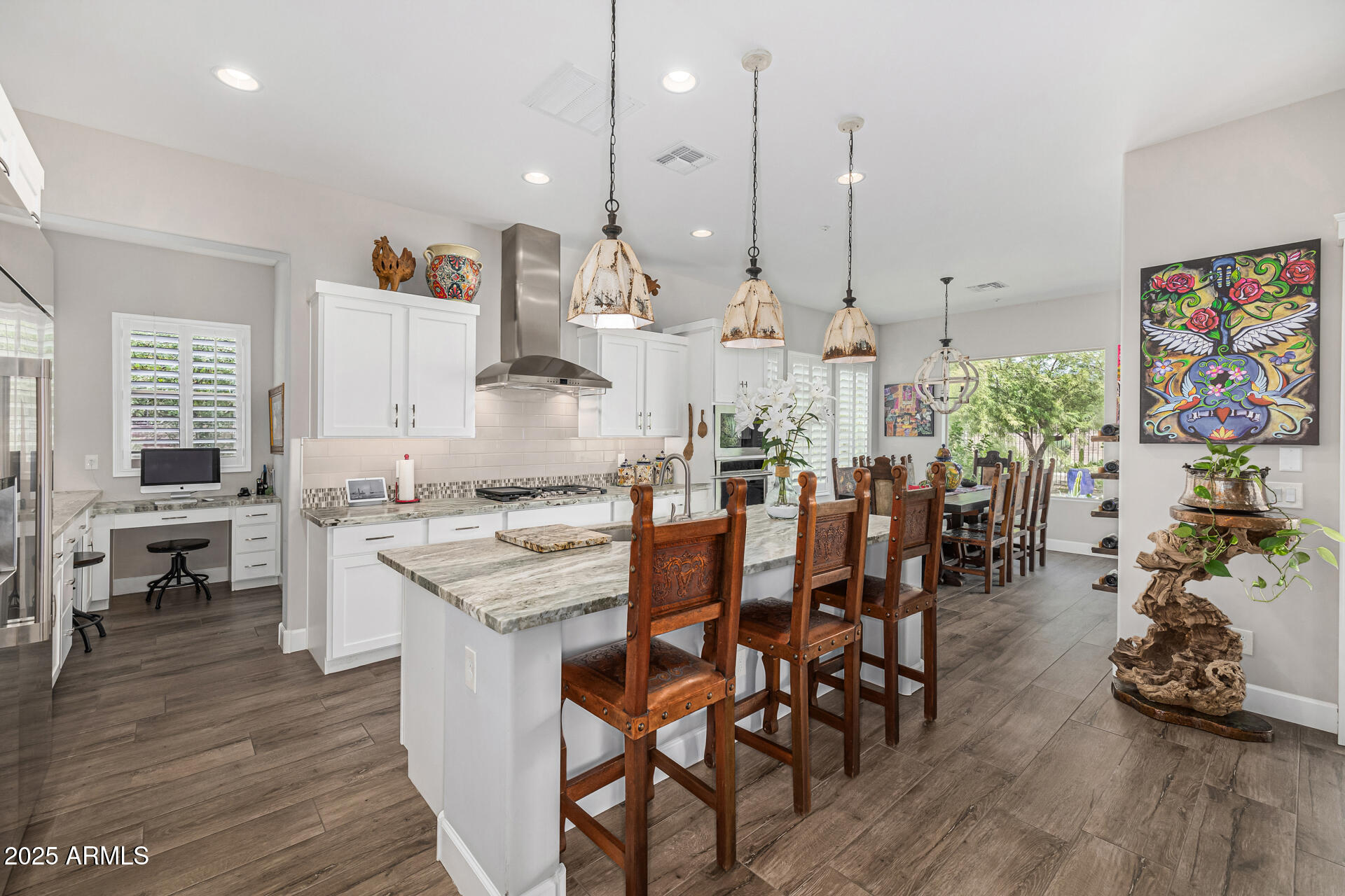 17810 East StockingTrail Rio Verde, AZ 85263 - Photo 15 of 61 a large kitchen with lots of counter space and wooden floor