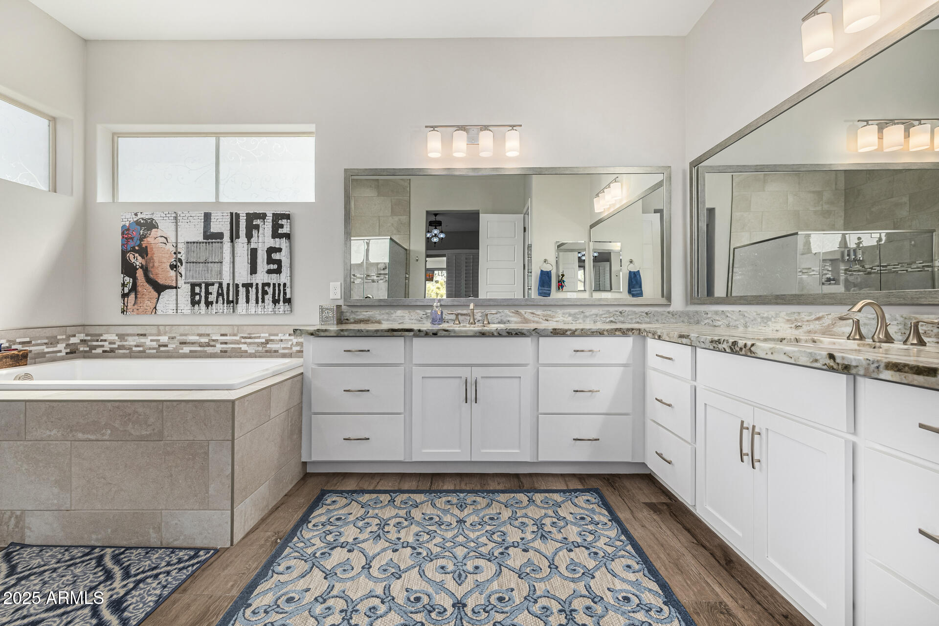 17810 East StockingTrail Rio Verde, AZ 85263 - Photo 19 of 61 a spacious bathroom with a granite countertop sink mirror and a