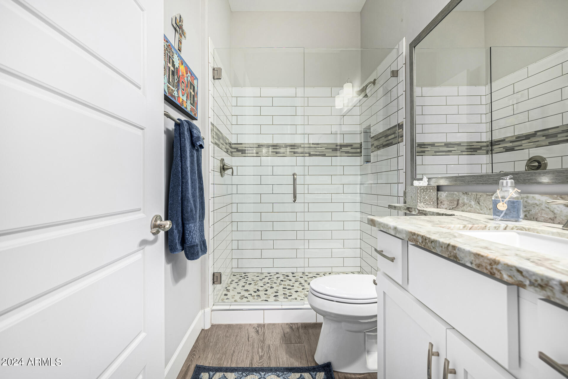 17810 East StockingTrail Rio Verde, AZ 85263 - Photo 23 of 61 a bathroom with a granite countertop toilet sink and shower