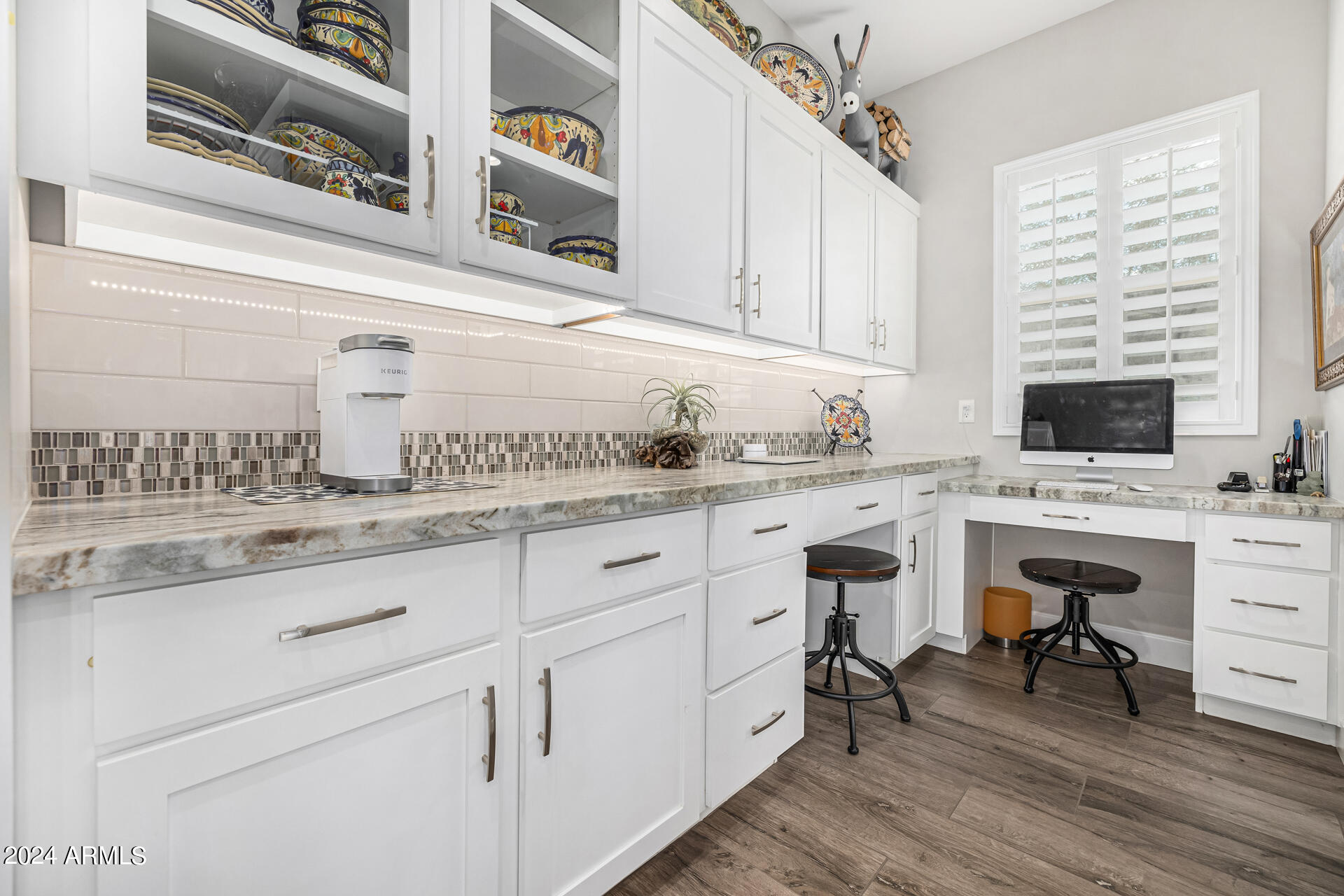 17810 East StockingTrail Rio Verde, AZ 85263 - Photo 25 of 61 a kitchen with cabinets appliances a sink and a counter top space