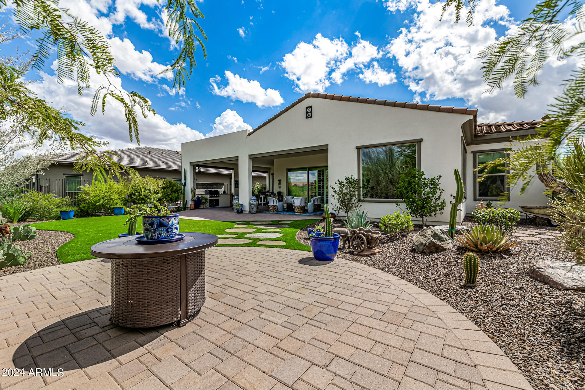 17810 East StockingTrail Rio Verde, AZ 85263 - Photo 34 of 61 a view of a house with backyard porch and sitting area
