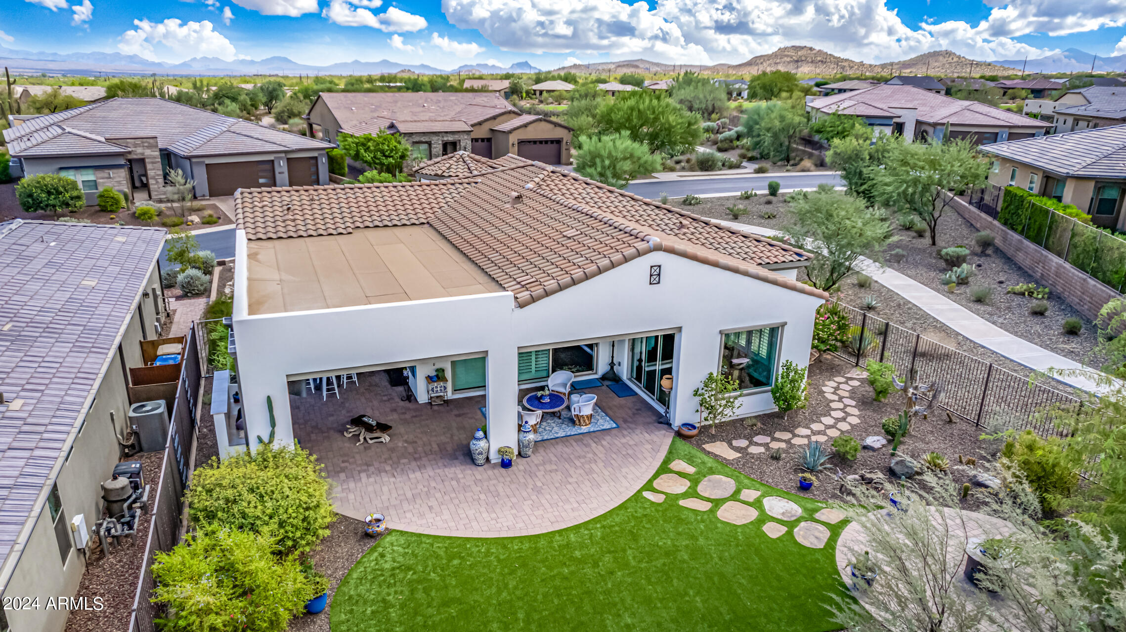 17810 East StockingTrail Rio Verde, AZ 85263 - Photo 42 of 61 an aerial view of a house with garden space and a patio